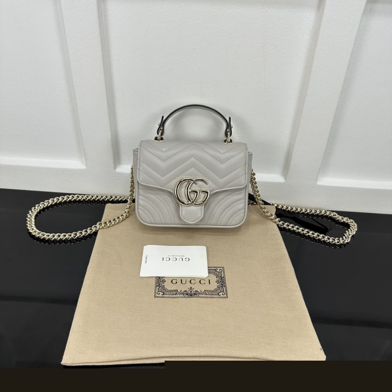G*u*i top handle bags